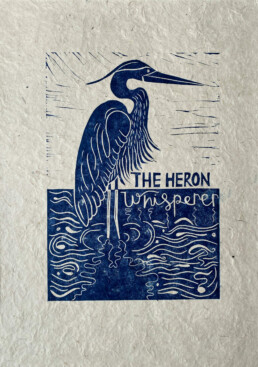 lino printed heron whisperer
